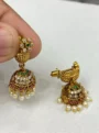 Antique Matte Gold-Plated Multi-Stone Jhumkas with Pearl Droplets kpr artistry