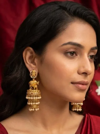 Divine Kamadhenu Pearl Jhumkas – Antique Gold Finish